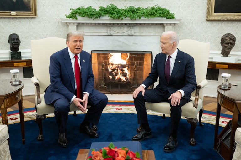Donald Trump and Joe Biden sit side by side in the Oval Office of the White House