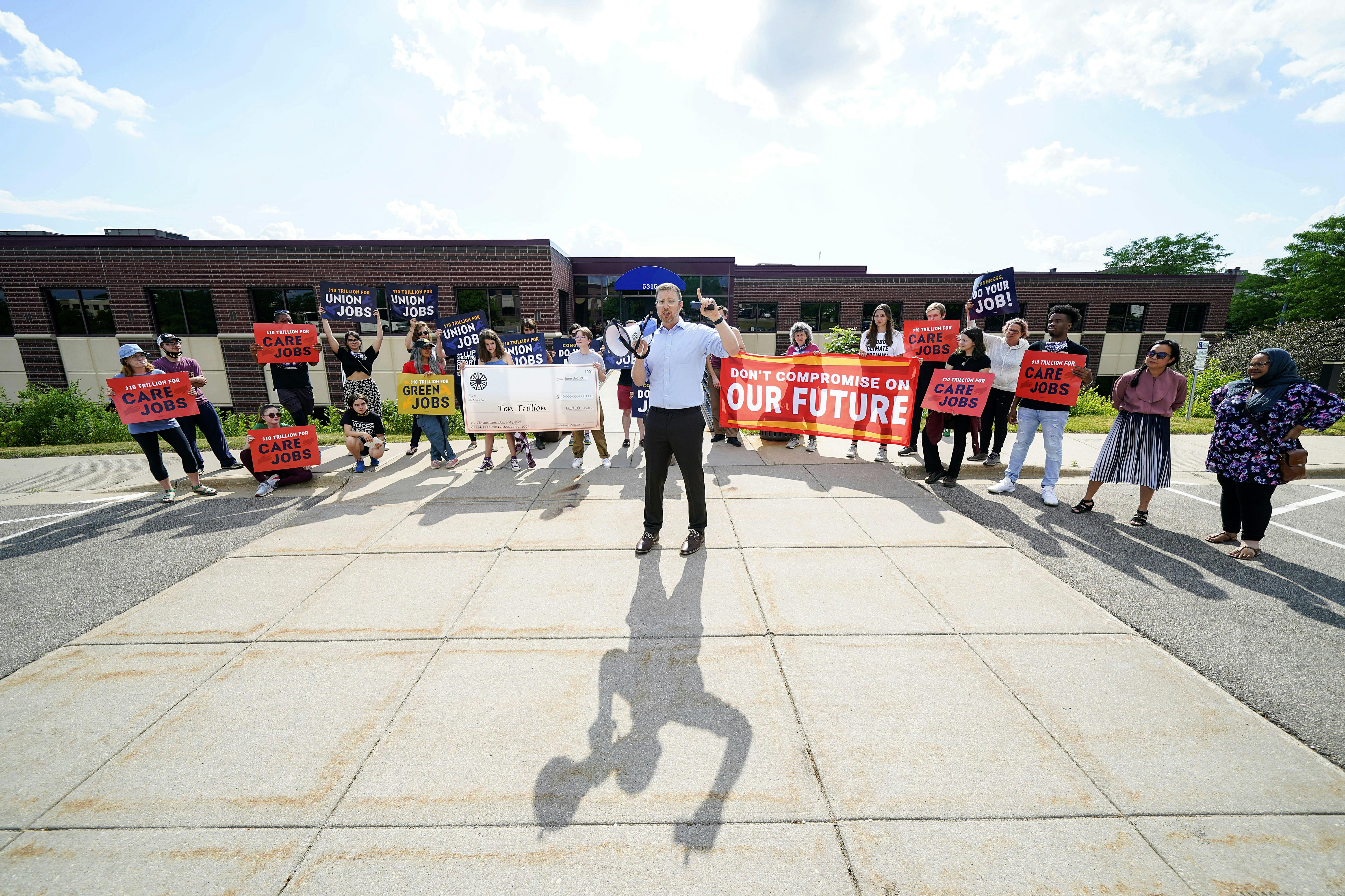 Wisconsin Democratic Party chair Ben Wikler speaks at rally in Madison, Wisconsin