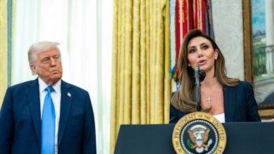 Donald Trump stands in the Oval Office and purses his lips. Next to him, Alina Habba speaks at a podium