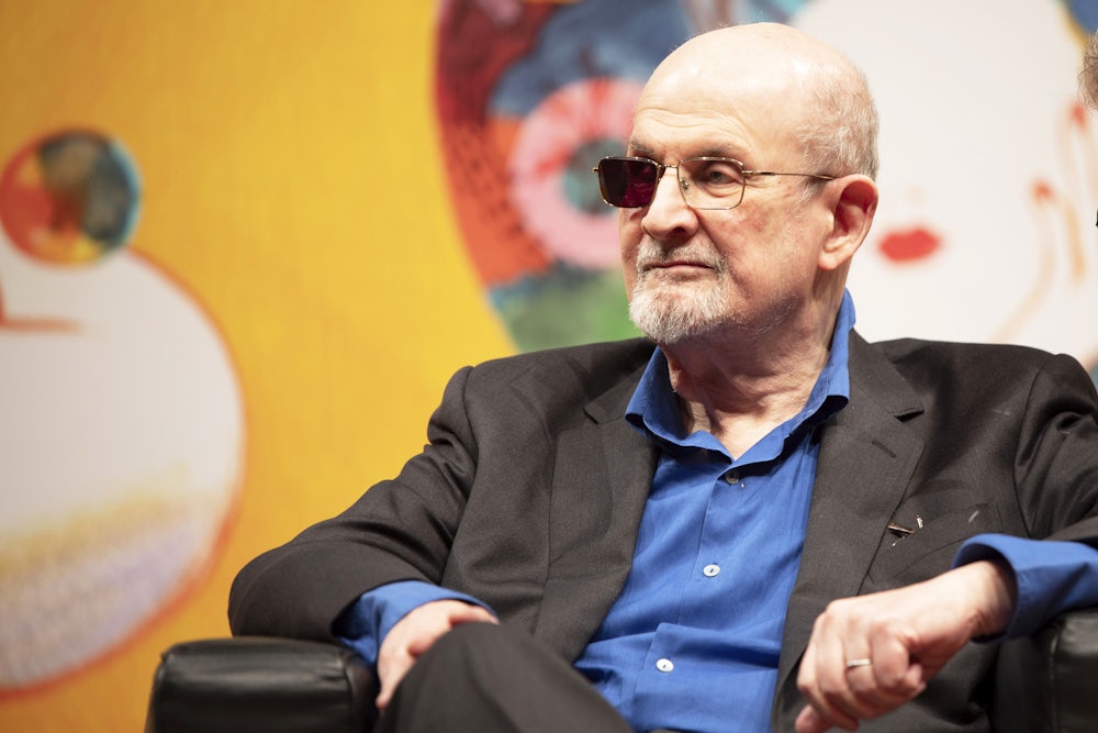 Author Salman Rushdie seated at the Turin Book Fair in Italy, May 2024
