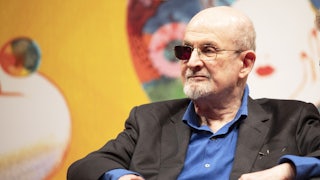Author Salman Rushdie seated at the Turin Book Fair in Italy, May 2024