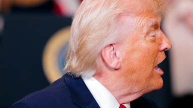 Donald Trump turns his head to the side while speaking