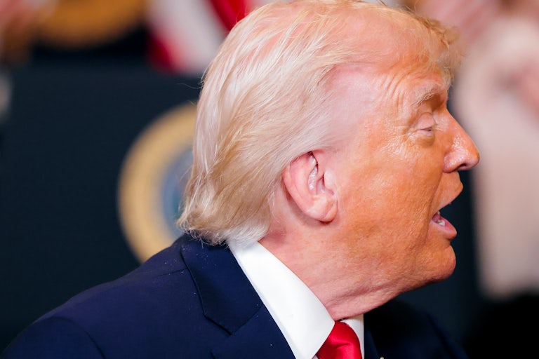 Donald Trump turns his head to the side while speaking