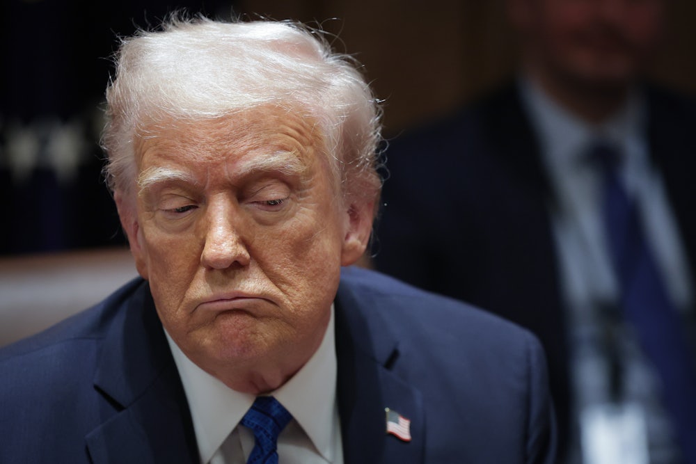 Donald Trump frowns.