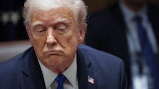 Donald Trump frowns.