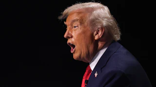 Donald Trump is seen in profile while speaking