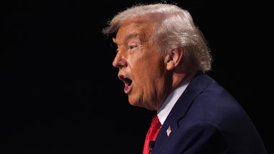 Donald Trump is seen in profile while speaking