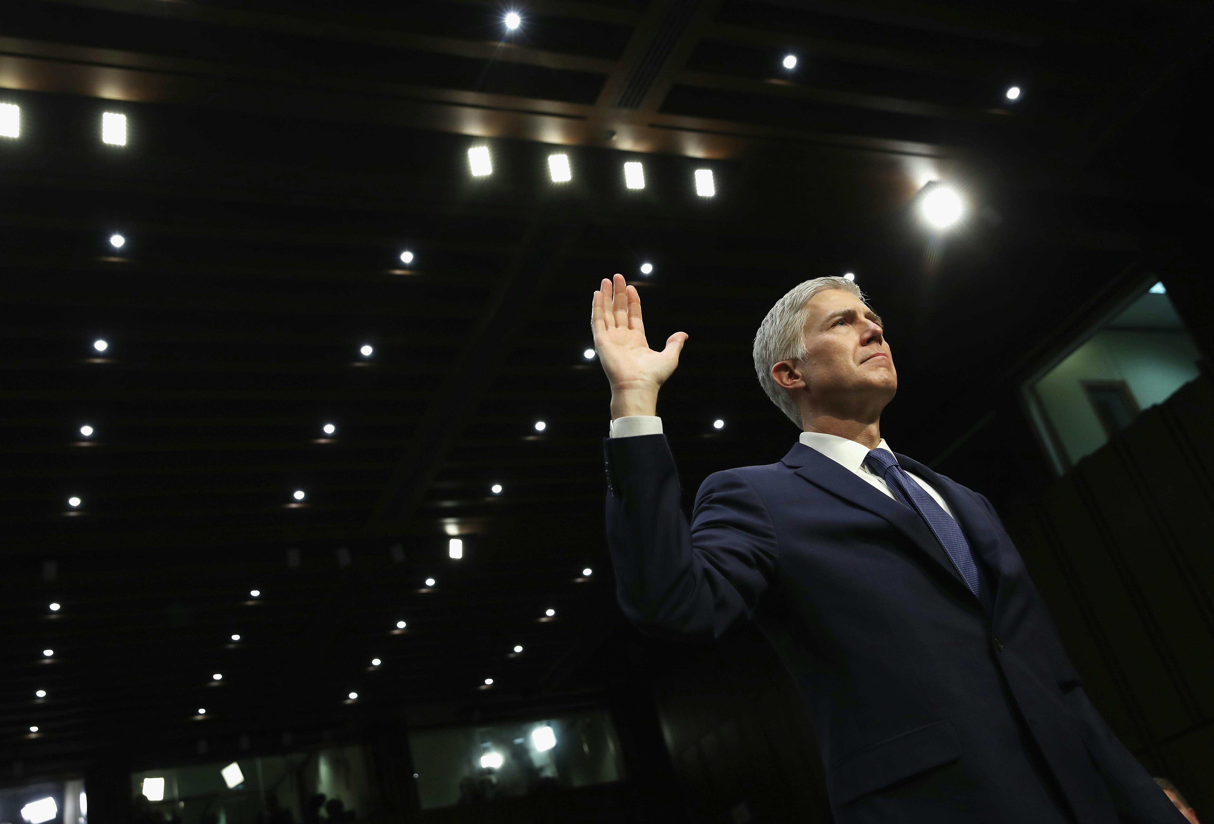 Judge Neil Gorsuch is sworn in on the first day of his Supreme Court confirmation hearing.