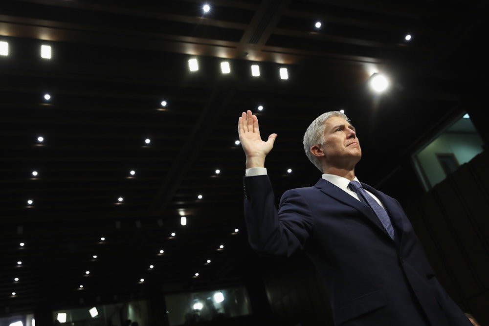 Judge Neil Gorsuch is sworn in on the first day of his Supreme Court confirmation hearing.