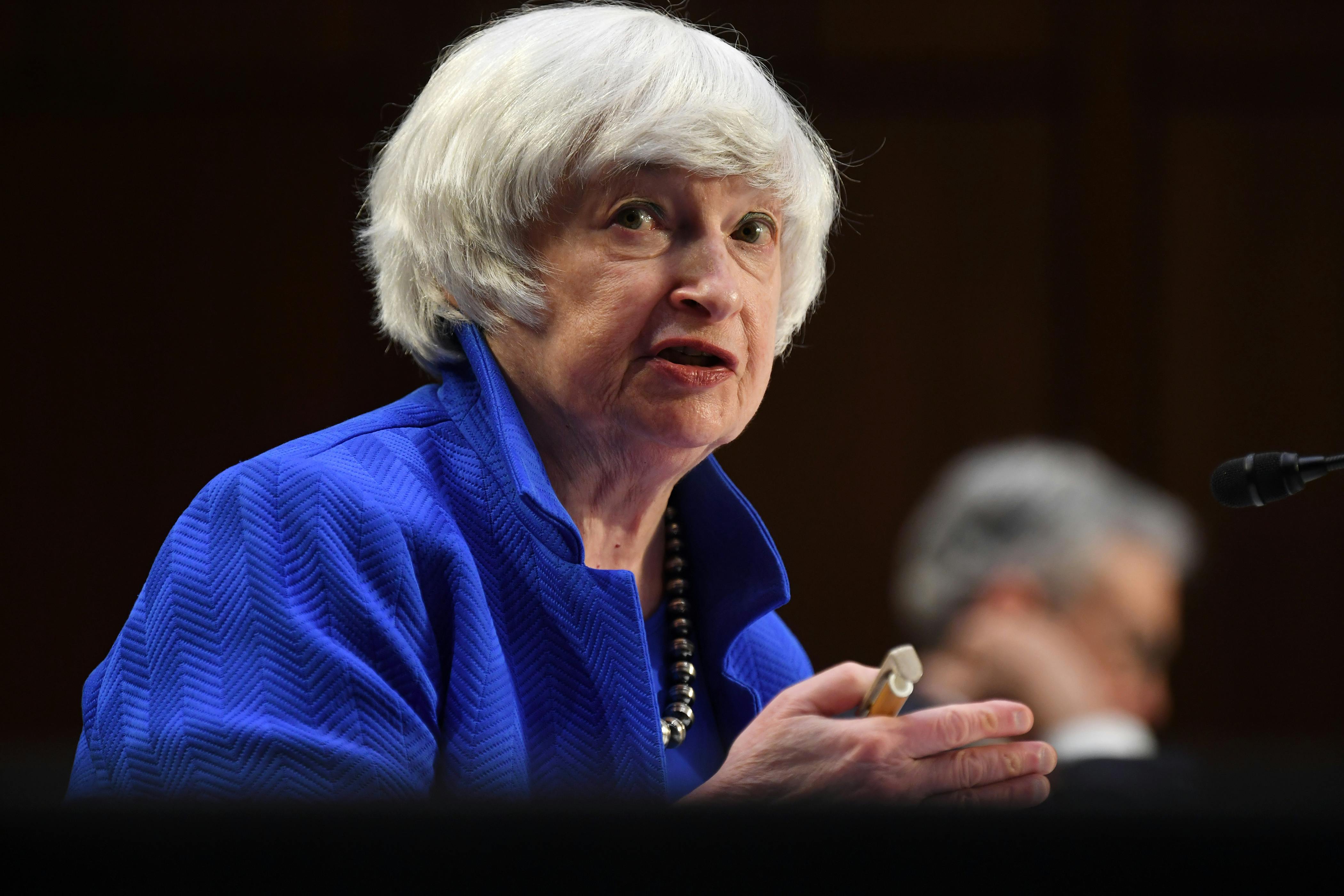 Janet Yellen speaks while seated.