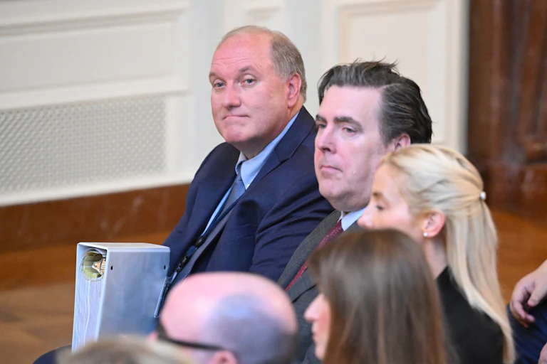John Solomon holds a binder as he attends the Trump address at the White House, on July 16.