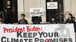 Demonstrators hold signs reading "Stop Willow" and "President Biden: Keep Your Climate Promises."