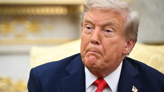 Donald Trump makes a weird face while sitting in the Oval Office