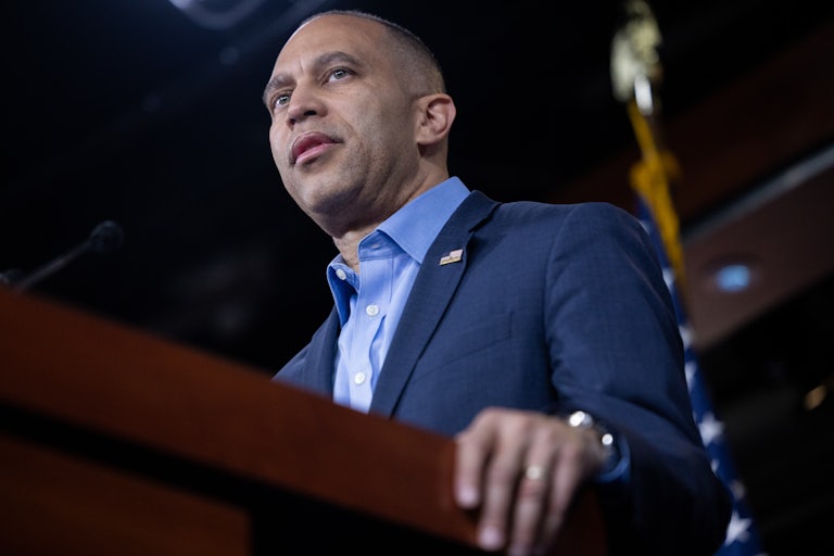 House Minority Leader Hakeem Jeffries stands at a podium during a press conference in the Capitol