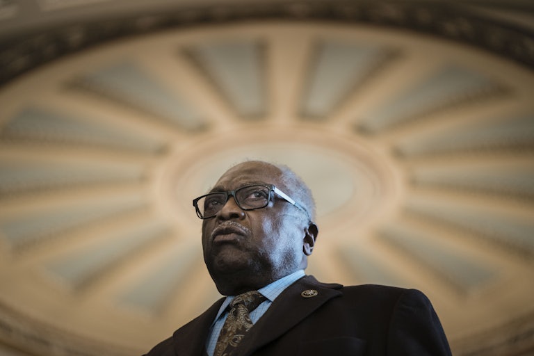 Jim Clyburn speaks beside members of the Congressional Black Caucus.