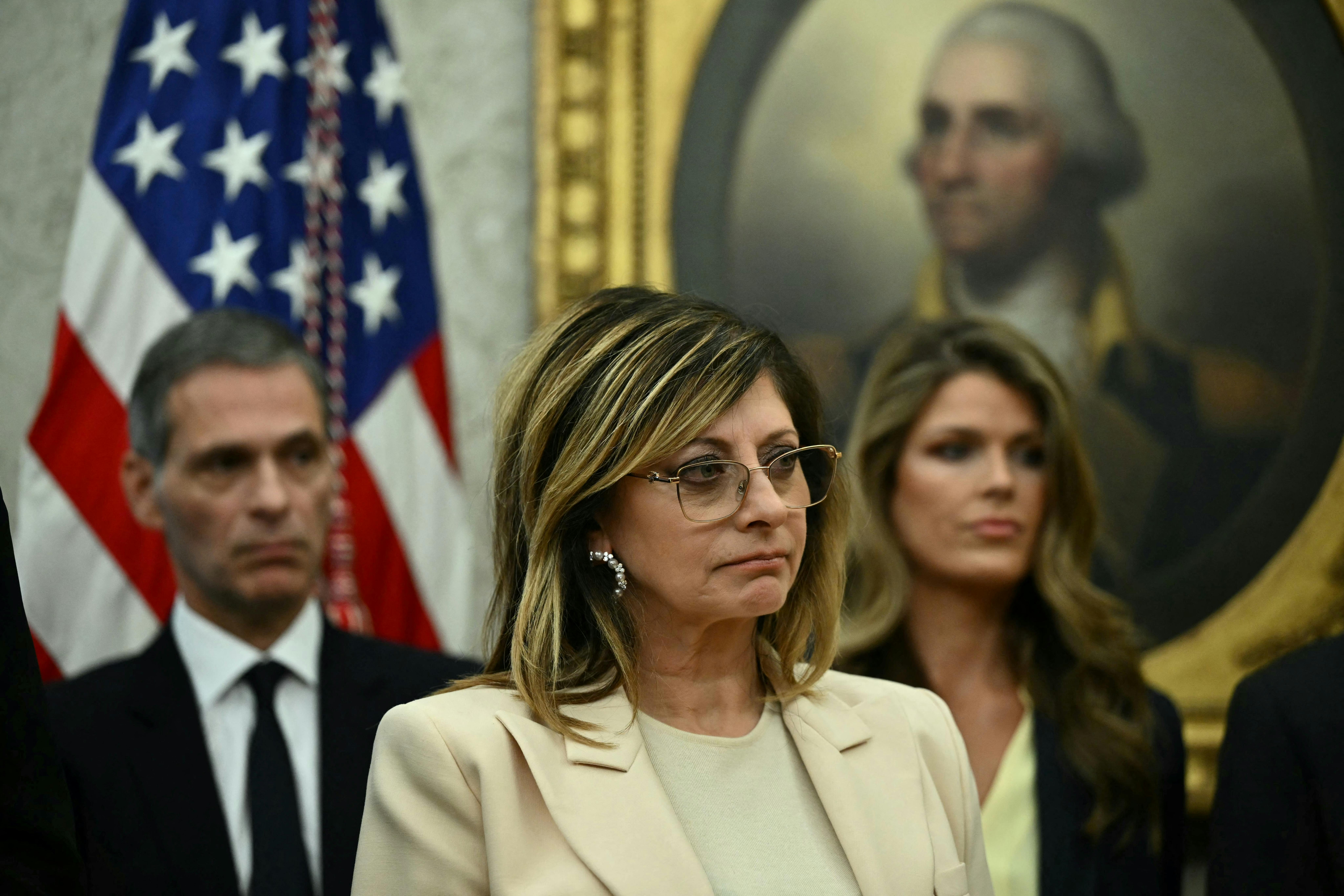 Fox host Maria Bartiromo stands in the Oval Office of the White House.