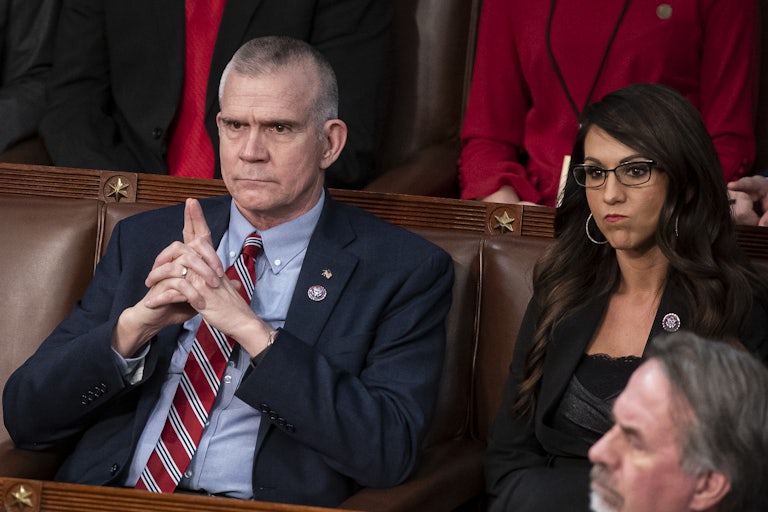 Representatives Matt Rosendale and Lauren Boebert seated beside each other