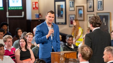 Charlie Kirk debates a student at The Cambridge Union
