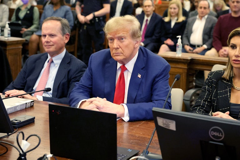 Donald Trump sits in the courtroom during his civil fraud trial at New York Supreme Court.