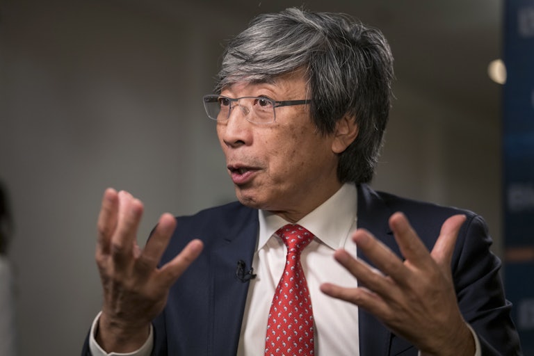 Los Angeles Times owner Patrick Soon-Shiong gestures while speaking