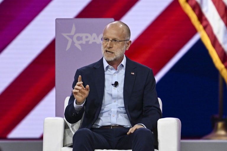 Brendan Carr gestures while speaking