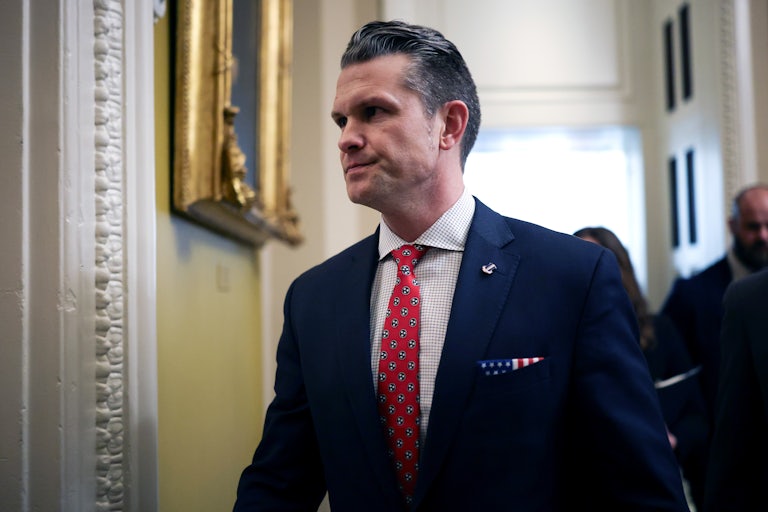 Defense Secretary Pete Hegseth walks in the Capitol