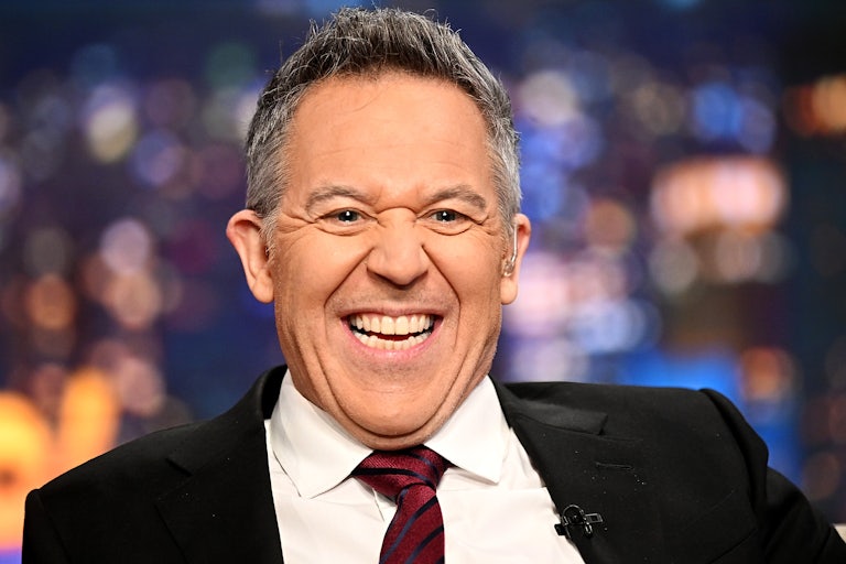 Fox host Greg Gutfeld laughs