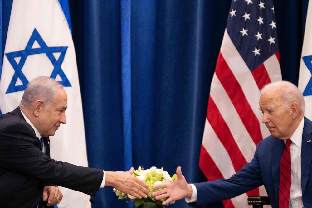 Biden shakes hands with Israeli Prime Minister Benjamin Netanyahu