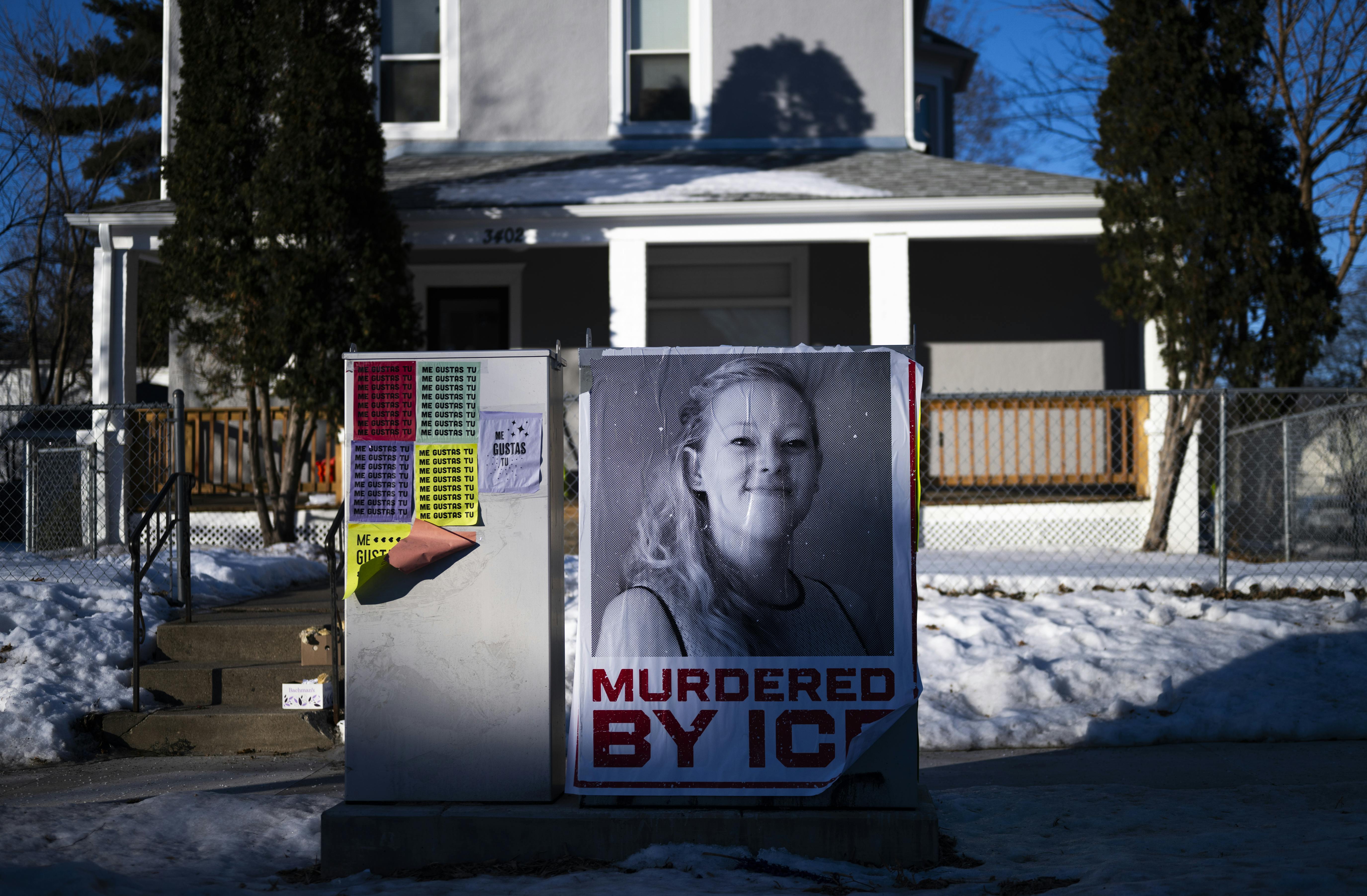 A poster that says, "Murdered by ICE" below a photo of Renee Nicole Good hangs in Minneapolis near where she was shot dead