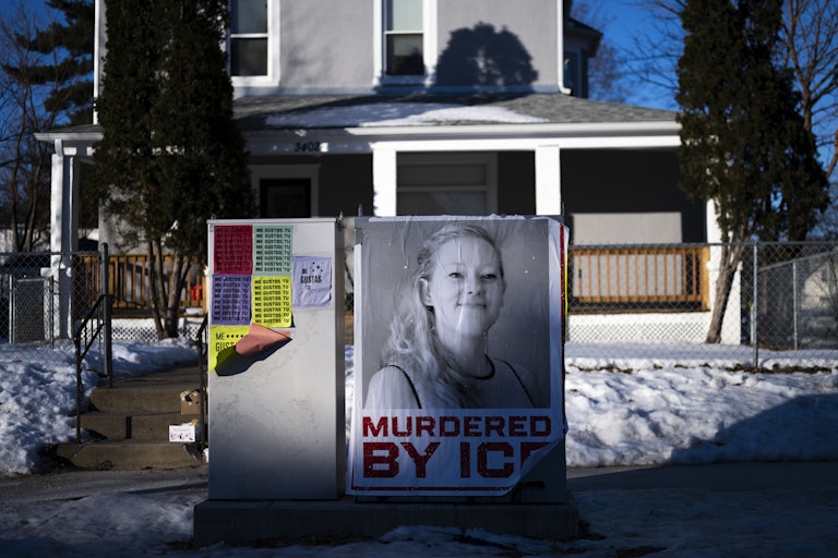 A poster that says, "Murdered by ICE" below a photo of Renee Nicole Good hangs in Minneapolis near where she was shot dead