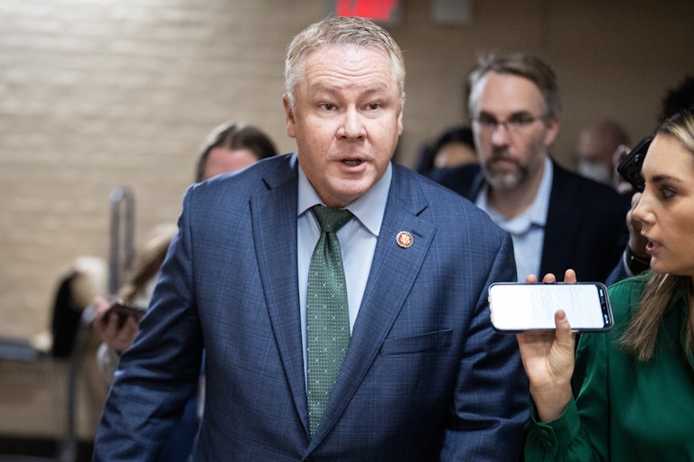 Republican Representative Warren Davidson looks shocked while walking in the Capitol.