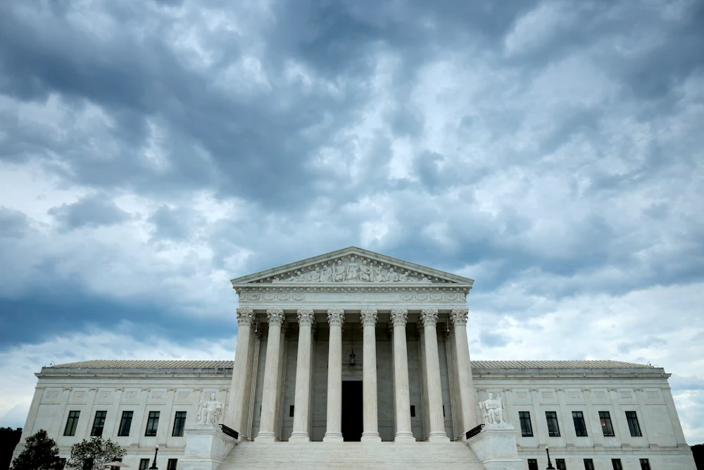 WASHINGTON, D.C. - JUNE 18: Rain clouds roll over the United States Supreme Court building on June 18, 2026 in Washington, D.C.