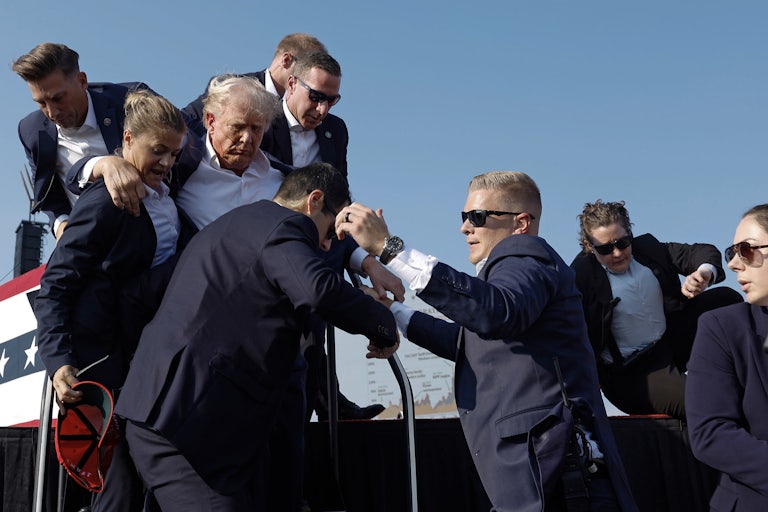 Secret Service agents rush Donald Trump off stage after he was shot during a rally