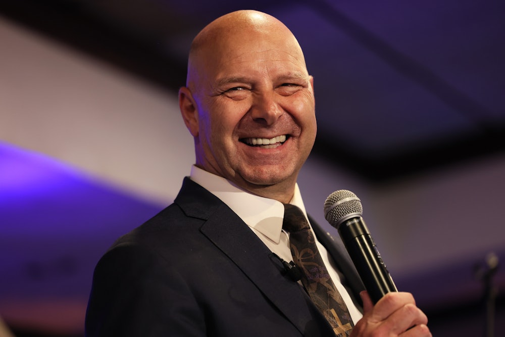 A close-up of a smiling GOP gubernatorial candidate Doug Mastriano.