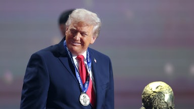 Donald Trump receives the FIFA Peace Prize at an award ceremony.