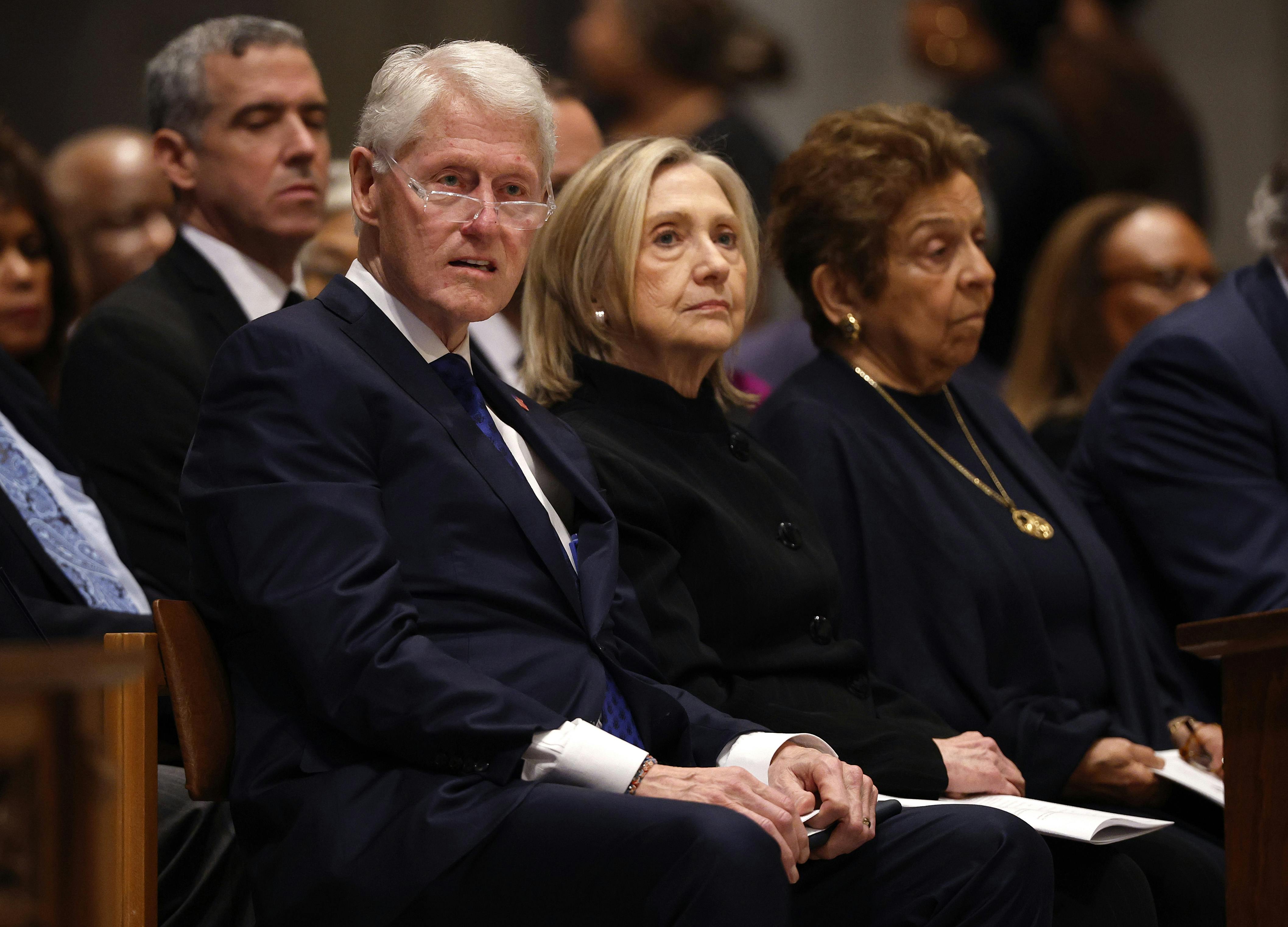 Former U.S. President Bill Clinton and former U.S. Secretary of State Hillary Clinton attend the funeral service of former Labor Secretary Alexis Herman at the National Cathedral on May 14, 2025 in Washington, D.C.