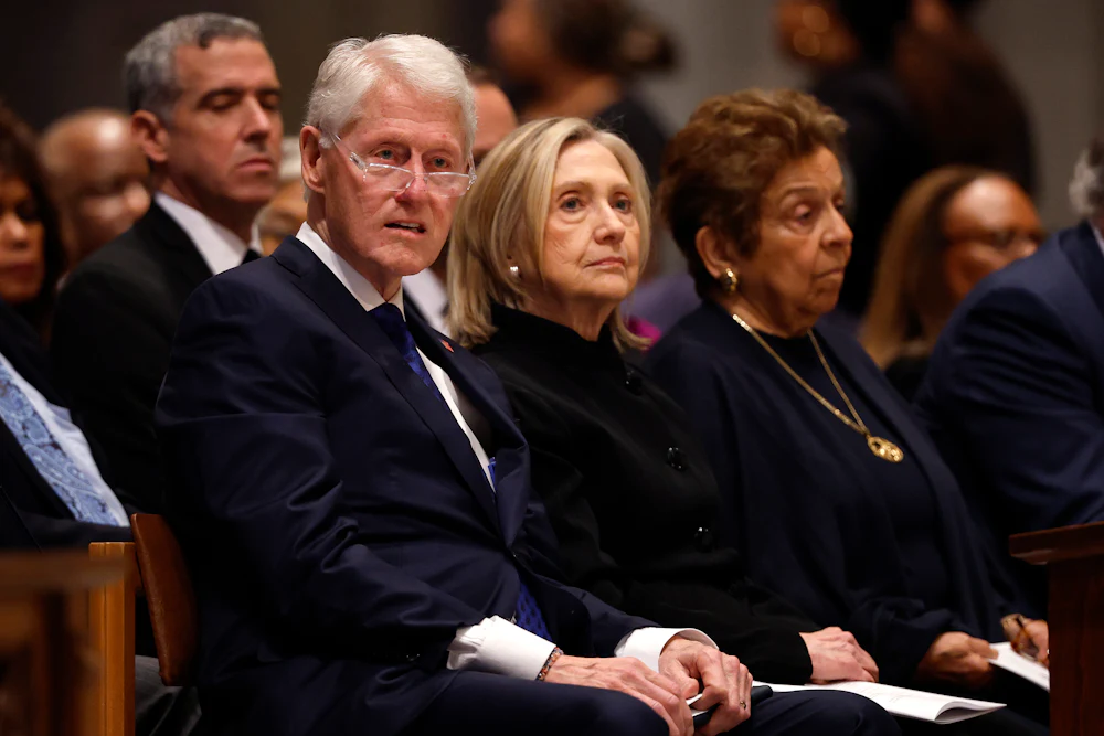 Former U.S. President Bill Clinton and former U.S. Secretary of State Hillary Clinton attend the funeral service of former Labor Secretary Alexis Herman at the National Cathedral on May 14, 2025 in Washington, D.C.