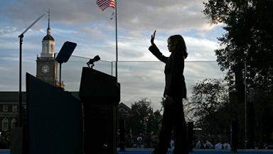 Kamala Harris waves at supporters as she walks off stage after speaking at Howard University in Washington, DC, on November 6, 2024.