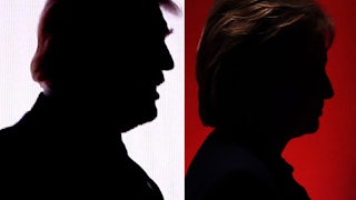Silhouettes of Donald Trump and Hillary Clinton are seen side by side.