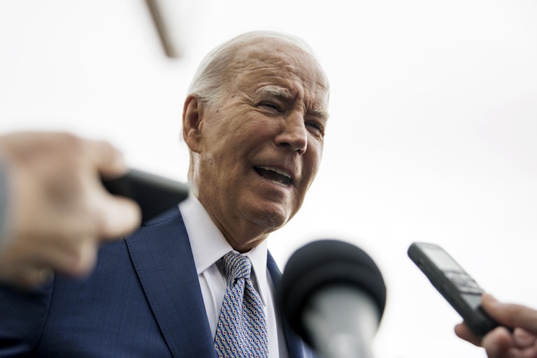 Biden answers reporters' questions