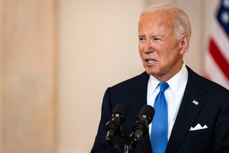 Joe Biden speaking at a couple mics