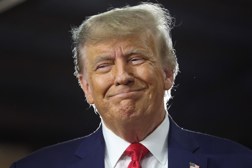 Former President Donald Trump smiling last October