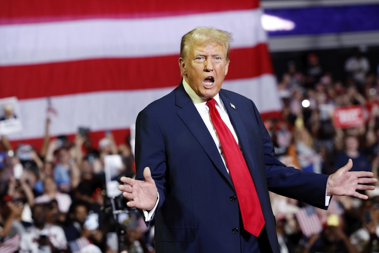 Donald Trump gestures as he speaks
