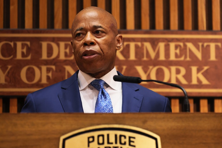 NYC Mayor Eric Adams speaks at a podium