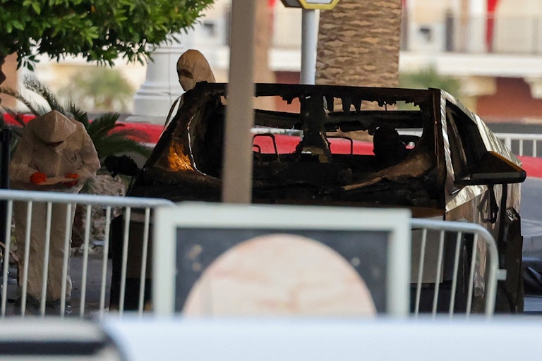 First responders investigate a Cybertruck that exploded outside the Trump International Hotel in Las Vegas