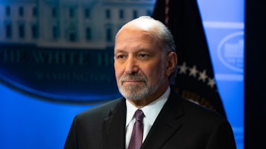 Commerce Secretary Howard Lutnick stands during a press conference