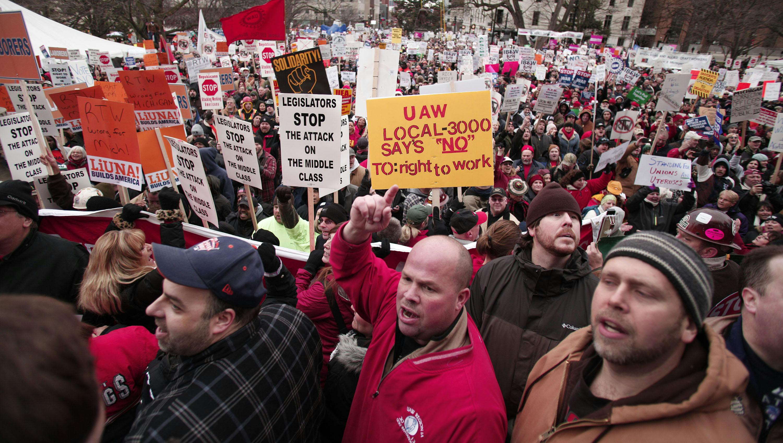 Union members protesting a vote on right-to-work legislation