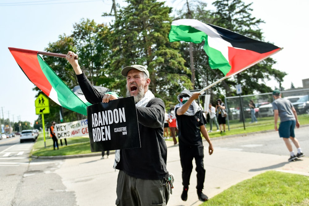 Longtime Democratic voter Abdul Bari, 57, protests outside a Biden rally