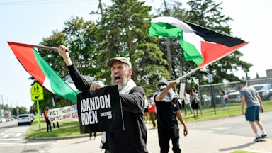 Longtime Democratic voter Abdul Bari, 57, protests outside a Biden rally