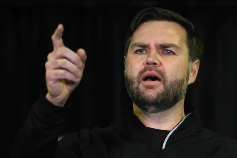 JD Vance raises his finger while speaking during a visit to a space base in Greenland